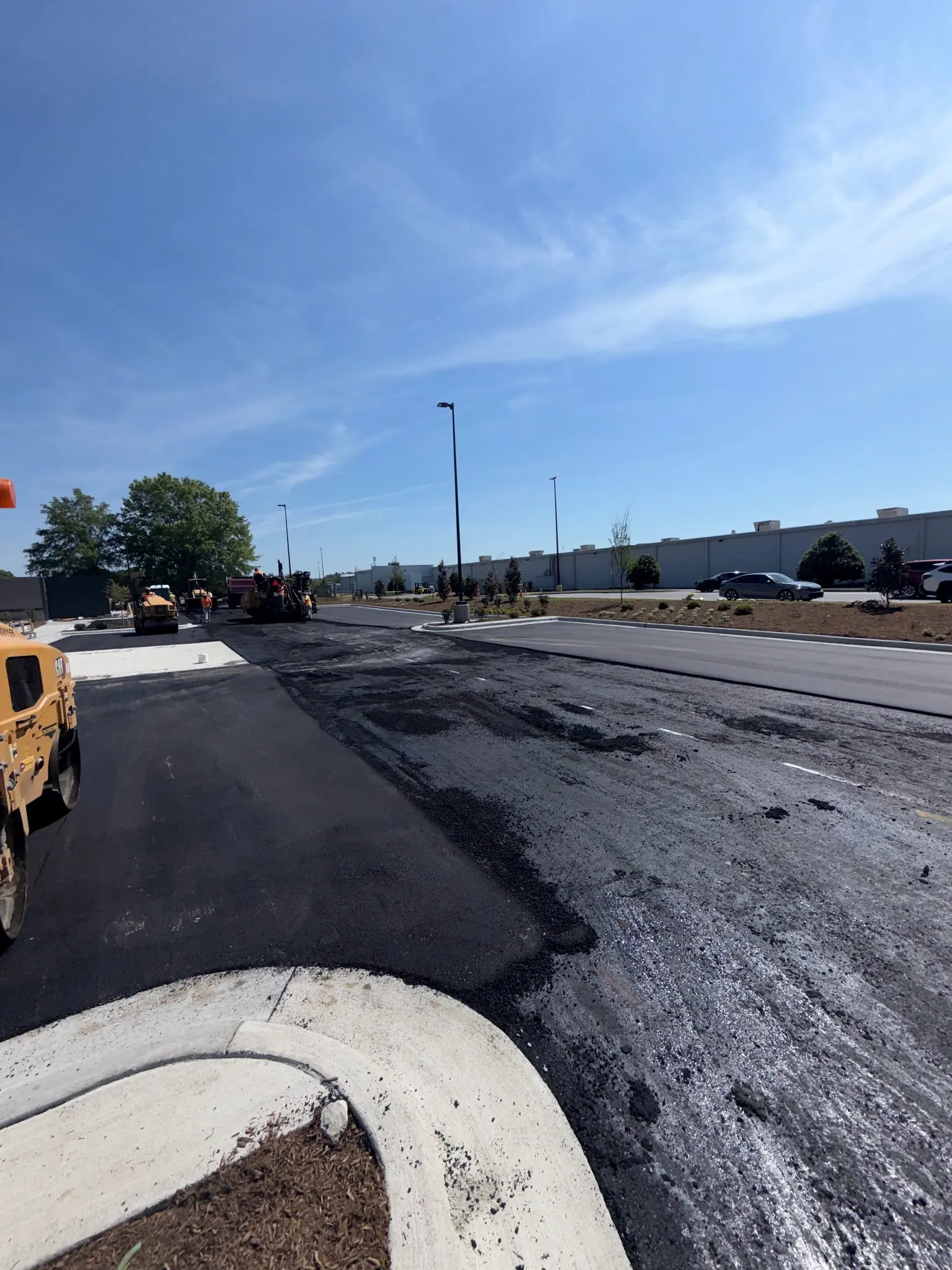 Paving and site work operations by Laser Construction