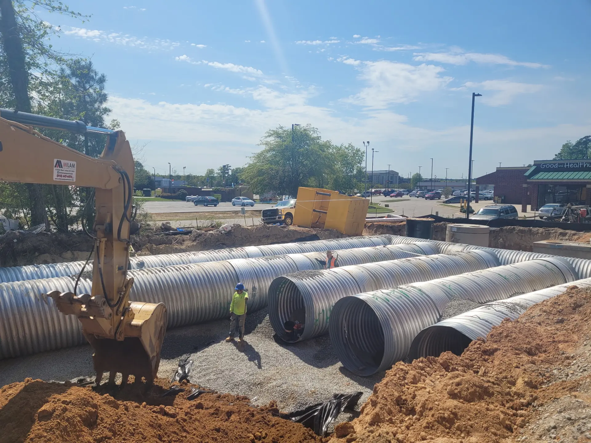 Underground utility line installation by Laser Construction